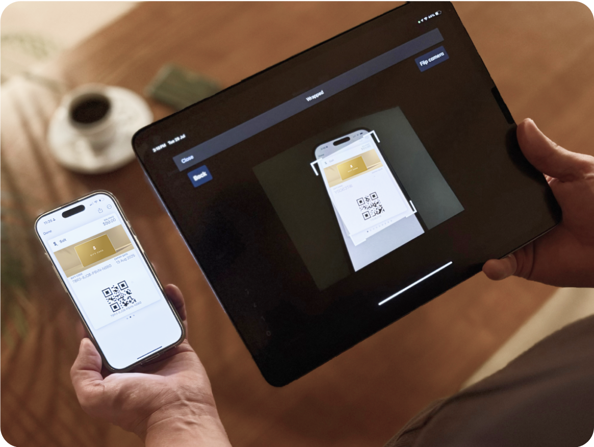 Gift card being scanned into POS for payment